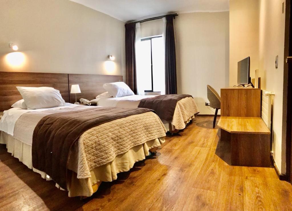 Ku Hotel Turismo تيموكو المظهر الخارجي الصورة
